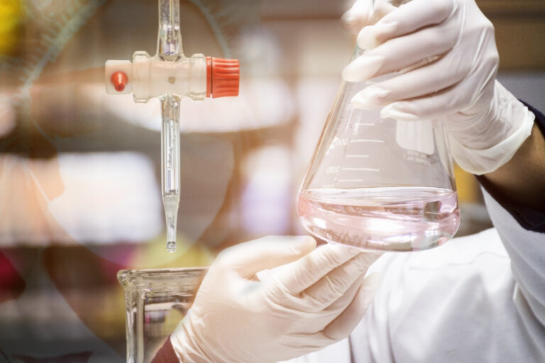 wet-chemistry-testing-beaker-with-glove